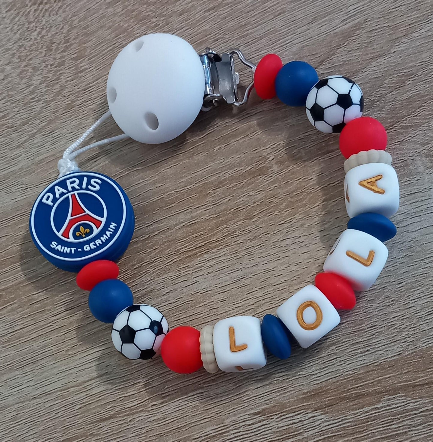 Attache tétine personnalisée Paris Saint Germain. Modèle Lola PSG pour fille et garçon. Cadeau naissance. Création française, fait main.
