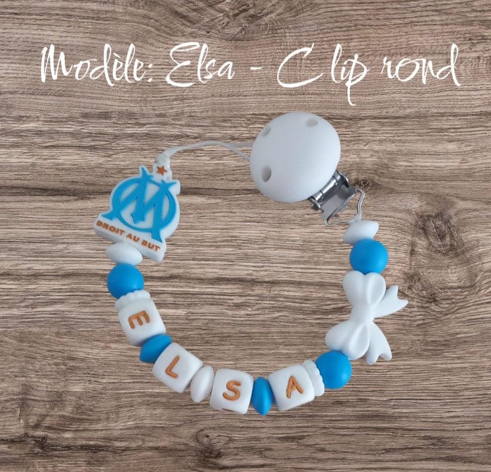 Attache tétine personnalisée Olympique de Marseille. Modèle Elsa OM fille. Cadeau naissance, baby shower, jeunes parents. Création française
